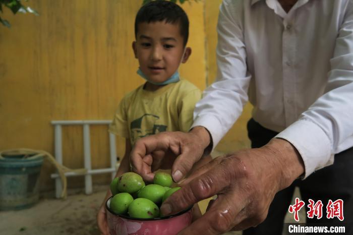 圖為進(jìn)藏先遣英雄連誓師地原址所在的新疆維吾爾自治區(qū)和田地區(qū)于田縣普魯村現(xiàn)貌?！畛坛?攝