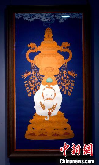 圖為5月16日，展覽中的新創(chuàng)唐卡作品《瑞象承香》?！±盍?攝