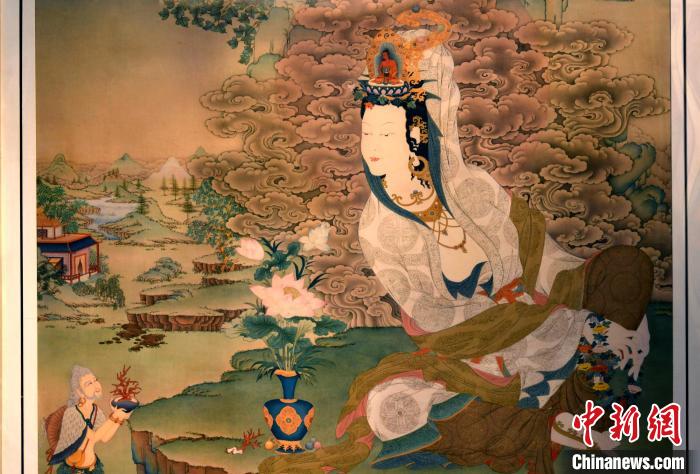 圖為5月16日，展覽中新創(chuàng)唐卡作品《靜息觀音》(局部)。　李林 攝